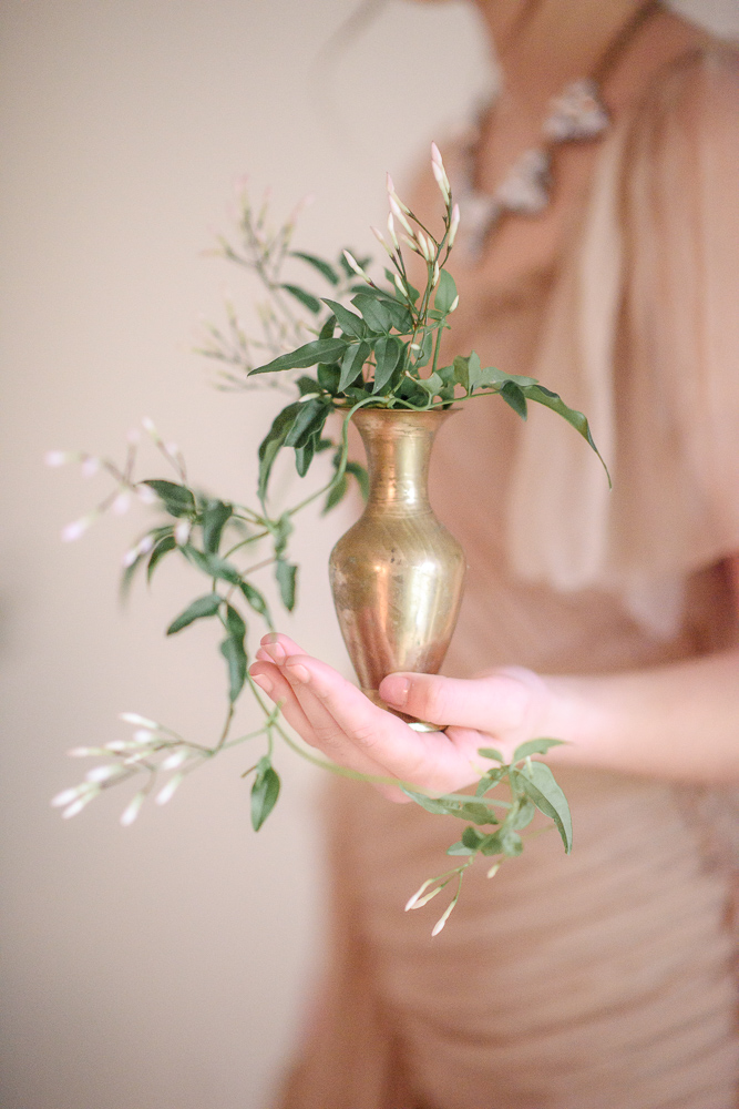 Green ivy in vase Colours of the Wind Erin Wallis Photography West Coast Weddings Magazine