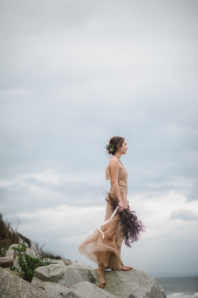 Blush bridal gown with lavender bouquet Colours of the Wind Erin Wallis Photography West Coast Weddings Magazine