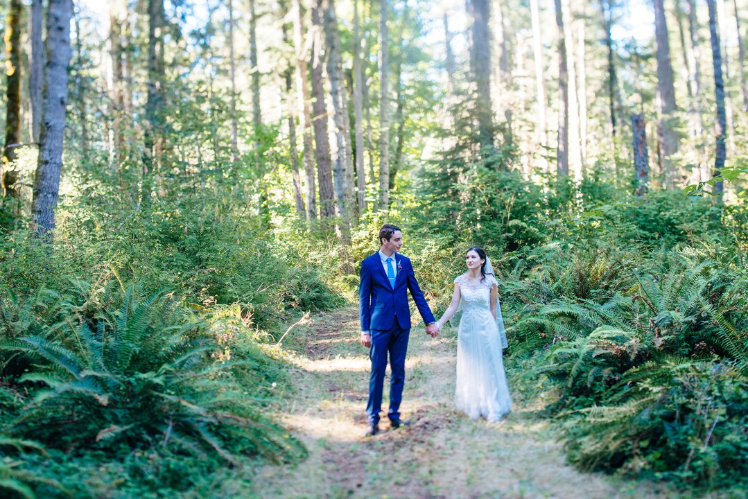 Newlyweds holding hands West Coast Weddings Magazine Cover