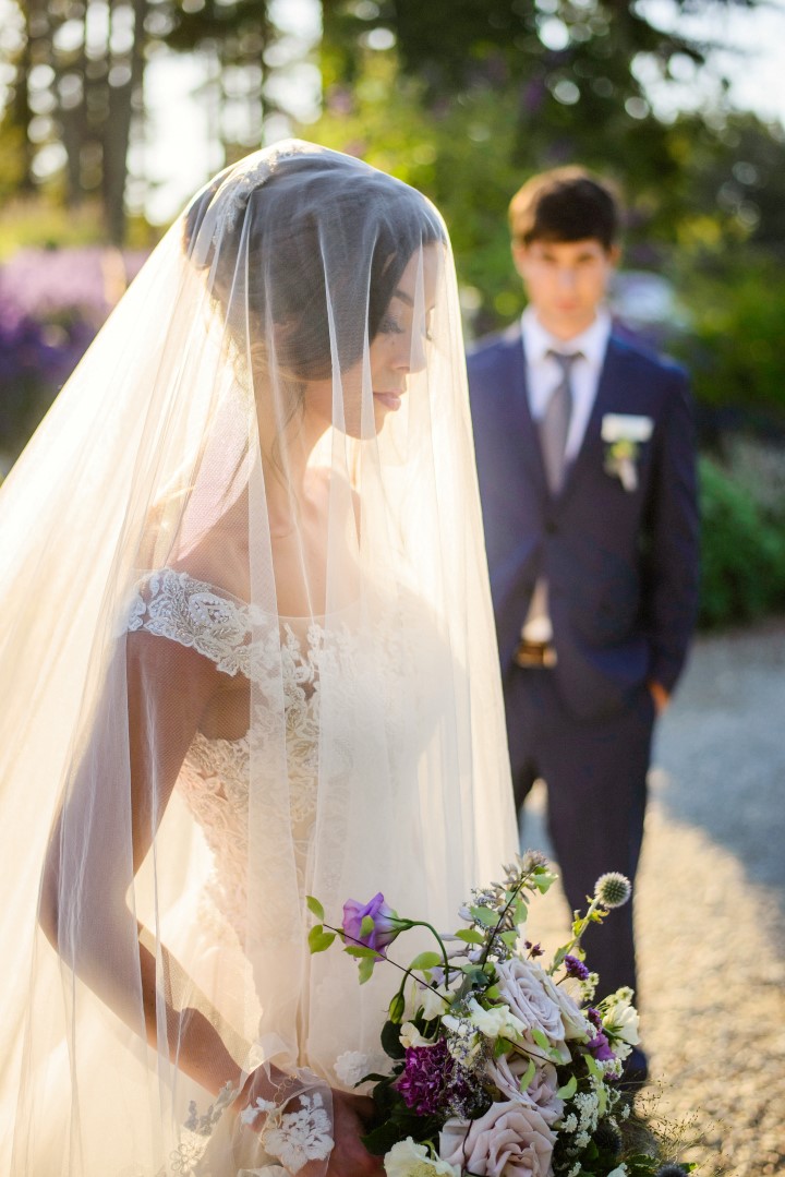 Veil over brides face in lavender field Kristen Borelli Photography