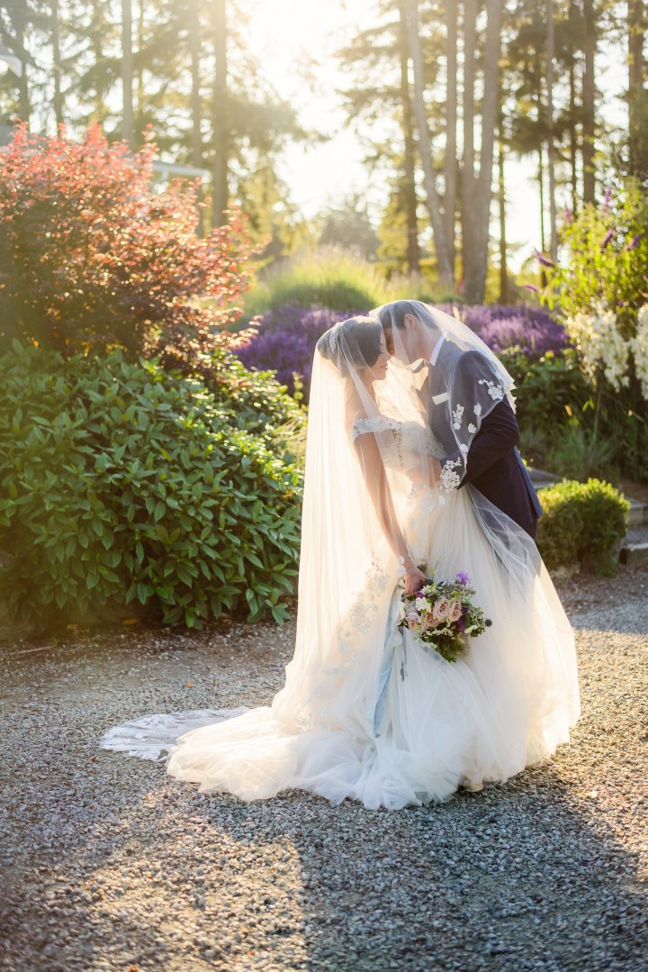 Couple kissing in field of lavender Kristen Borelli Photography