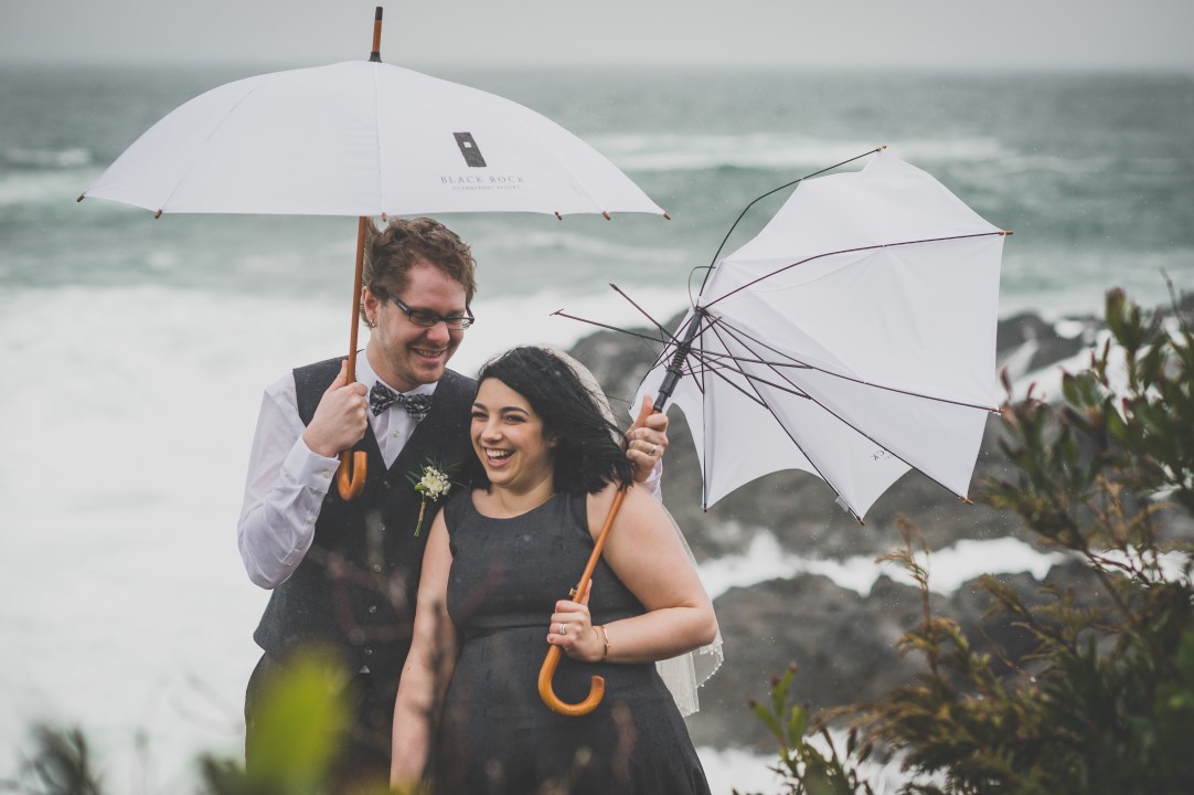 Newlyweds and UmbrellasWest Coast Elope Vancouver Island Wedding Magazine