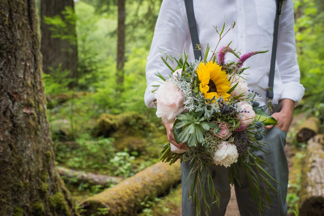 Groom Holding Bouquet Thrifty Foods Floral West Coast Weddings Magazine