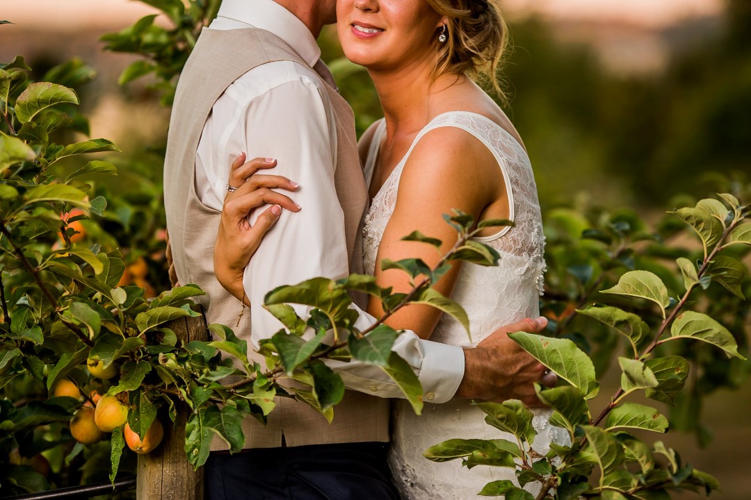 Vineyard Hug for NewlywedsSuns Golden Kiss West Coast Weddings Magazine