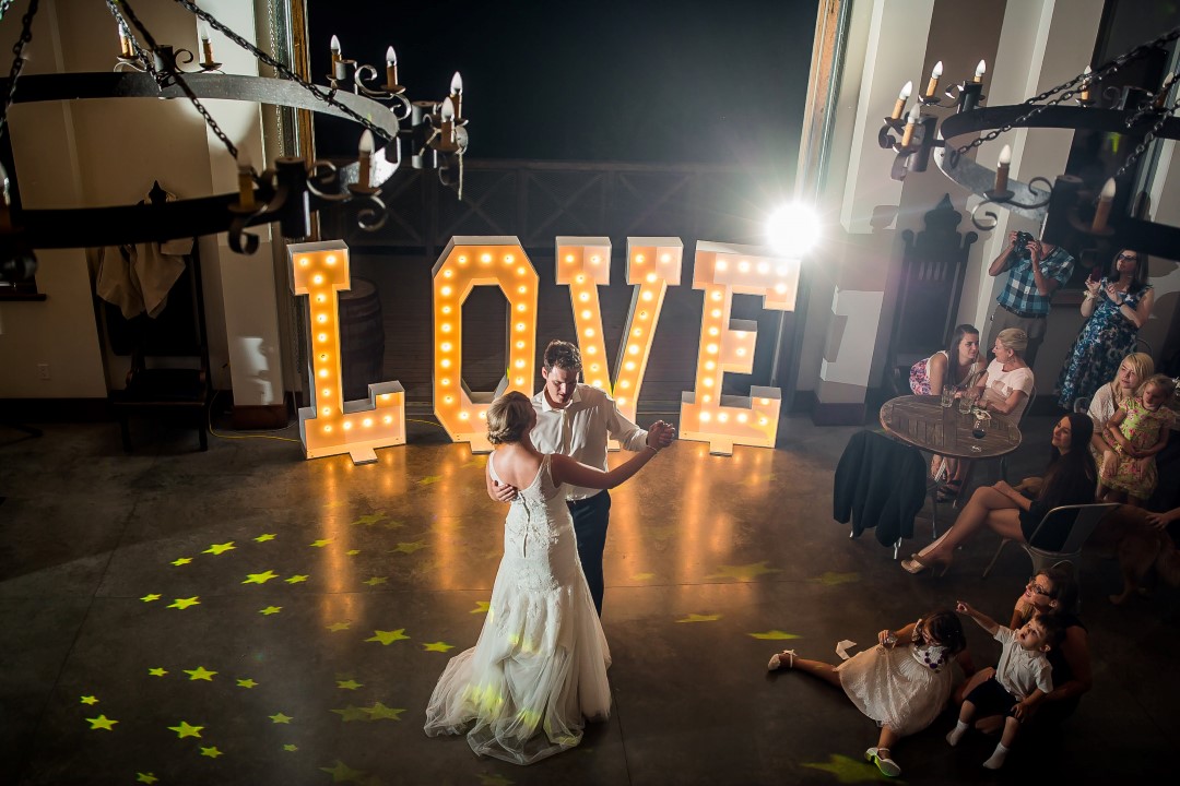 Lit Up Love Marquee at First DanceSuns Golden Kiss West Coast Weddings Magazine