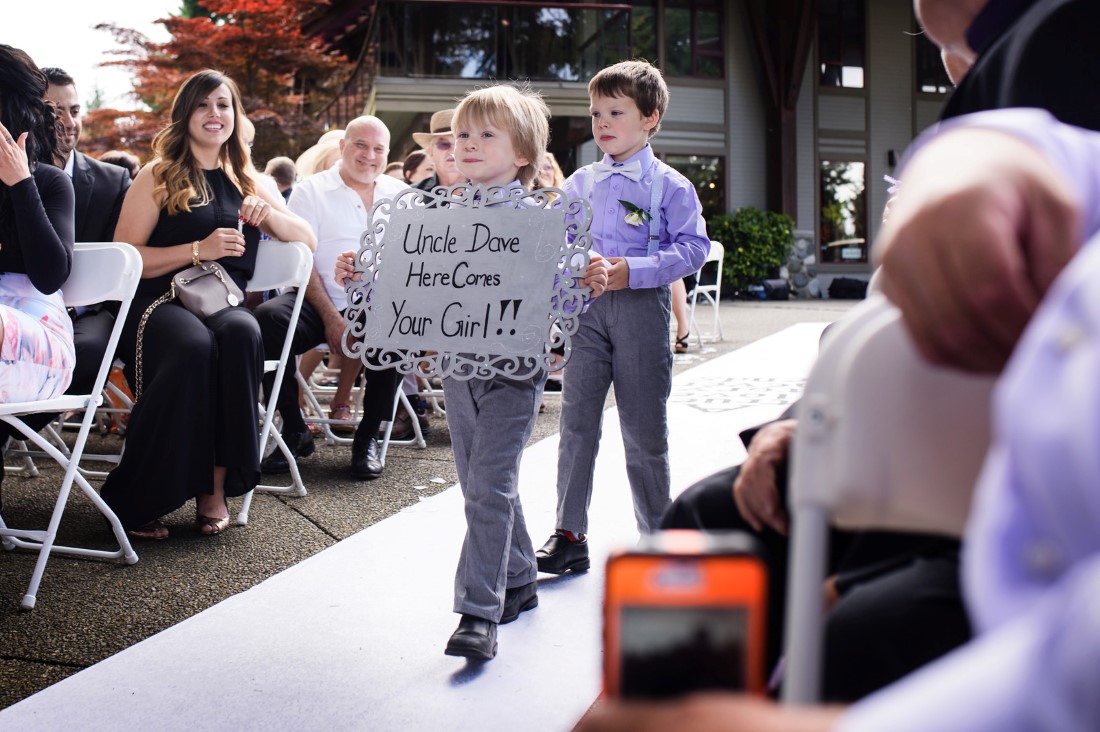 Ring Bearer Carrying Sign Crown Isle Love Story on Vancouver Island