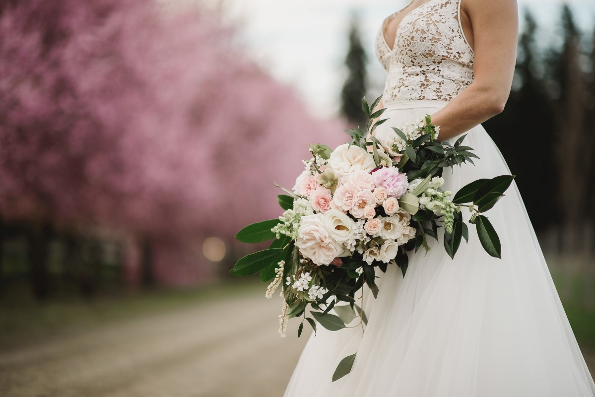 Bouquet Cherry Blossom Ceremony Circle Arch | Erin Wallis Photography | Sublime Celebrations | Karen Bezaire | Shelter Point Distillery | The White Peony | Jims Clothes Closet | Purely Flower | Headquarters Hair Studio | Eden Street Spa | West Coast Weddings Magazine