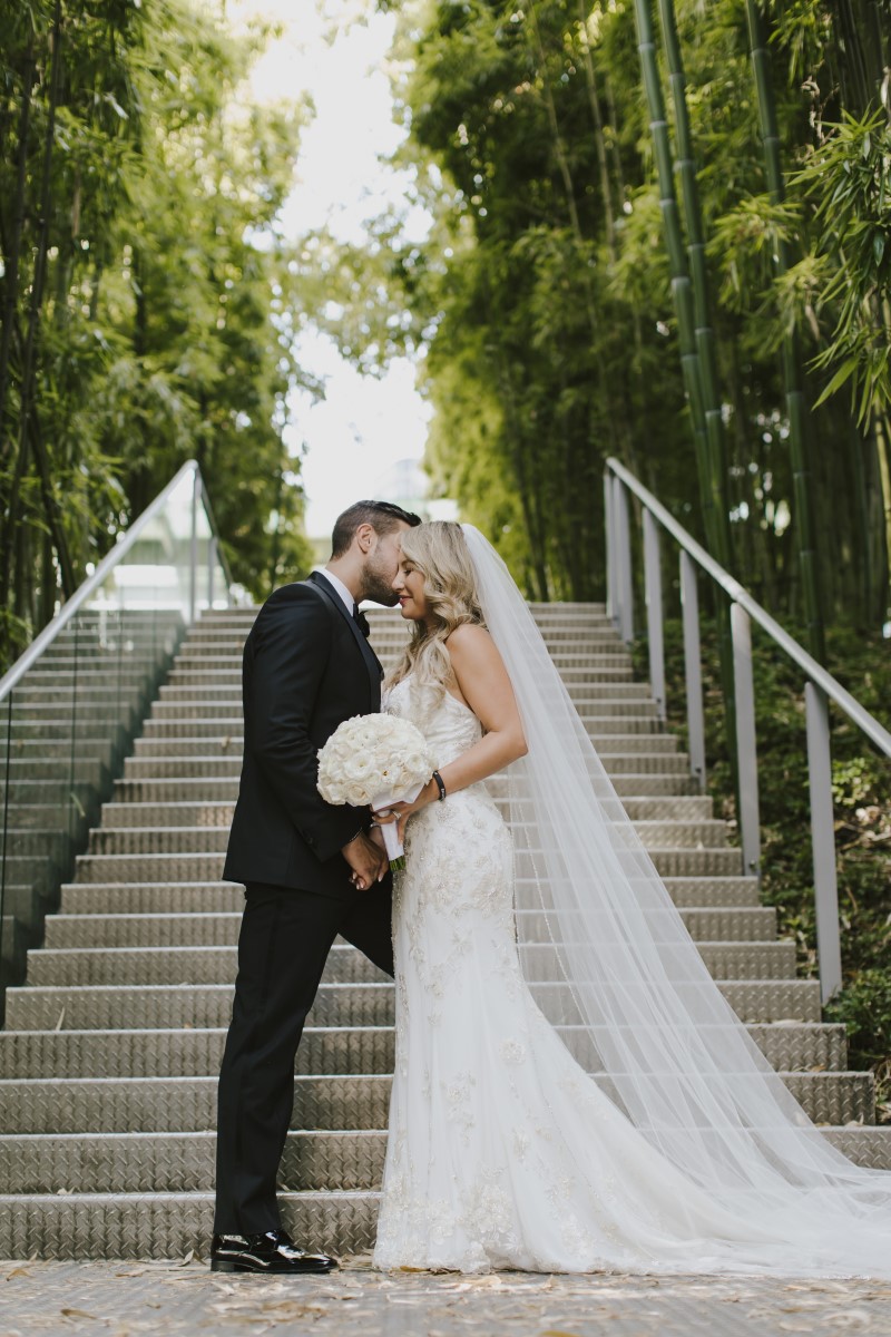 Kissing Kayseeb abd Stevan Silk Sophistication Ophelia Photography Vancouver West Coast Weddings Magazine