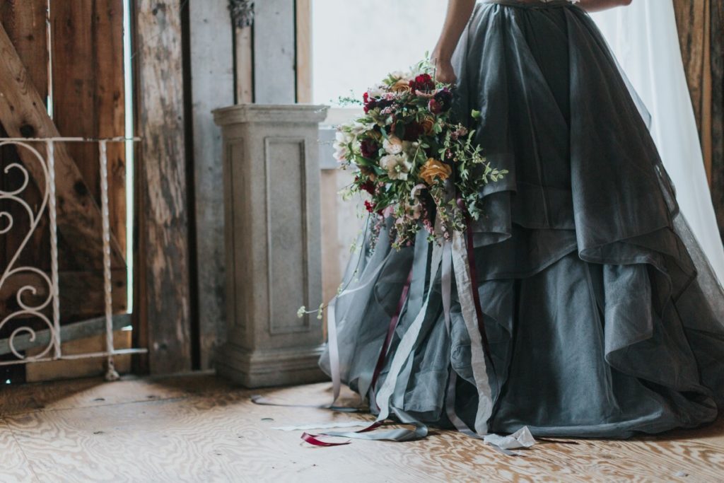 Bride in Blue Dreamy Moody Blue Romance Summer Rayne Photo West Coast Weddings Magazinee Dress Bouquet