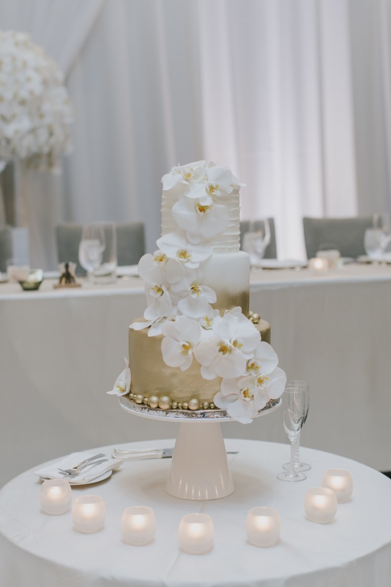 White Orchid Cake Table Kayseeb abd Stevan Silk Sophistication Ophelia Photography Vancouver West Coast Weddings Magazine