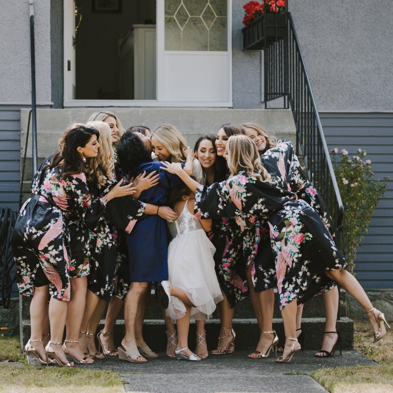 Bridesmaids Hugging Kayseeb abd Stevan Silk Sophistication Ophelia Photography Vancouver West Coast Weddings Magazine