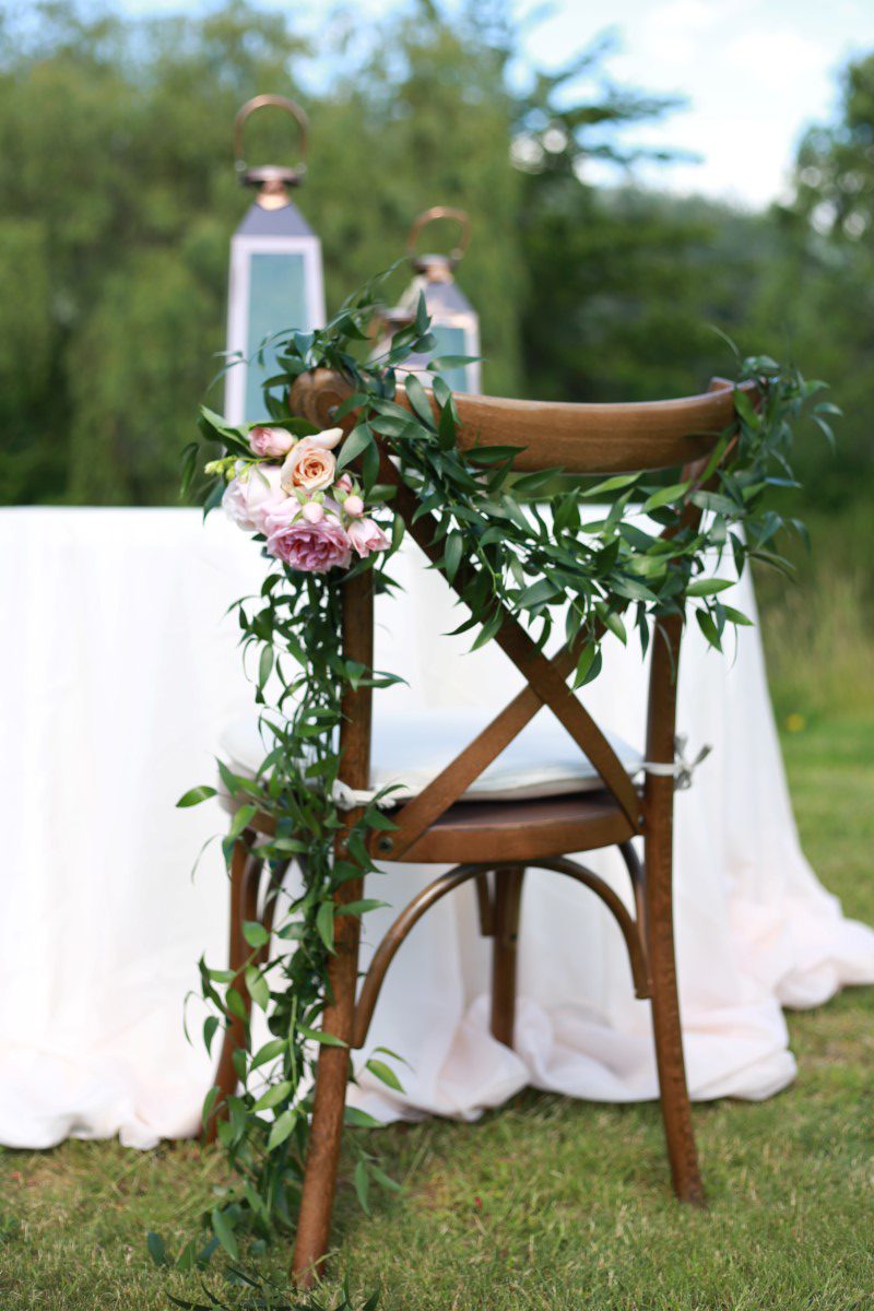 Chair with Garland Champagne Wedding West Coast Weddings Magazine