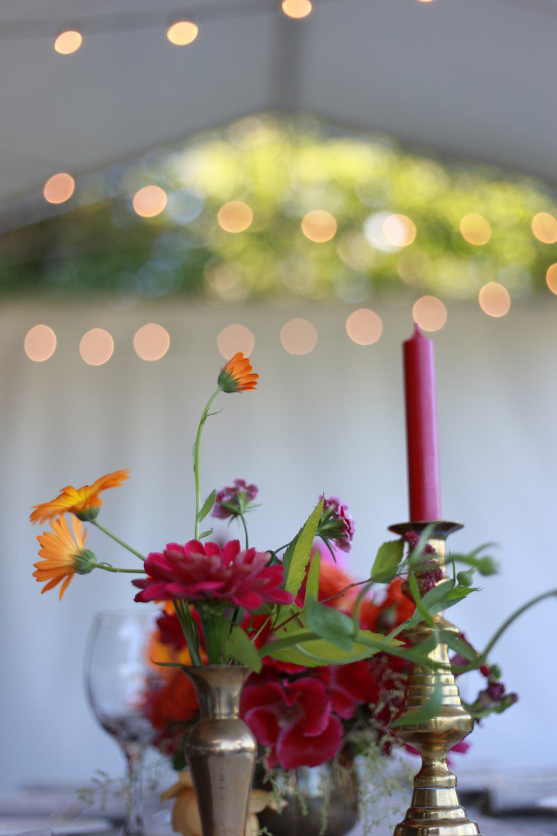 Red Roses and Candlesticks in Reception Tent Champagne Wedding Vancouver Island