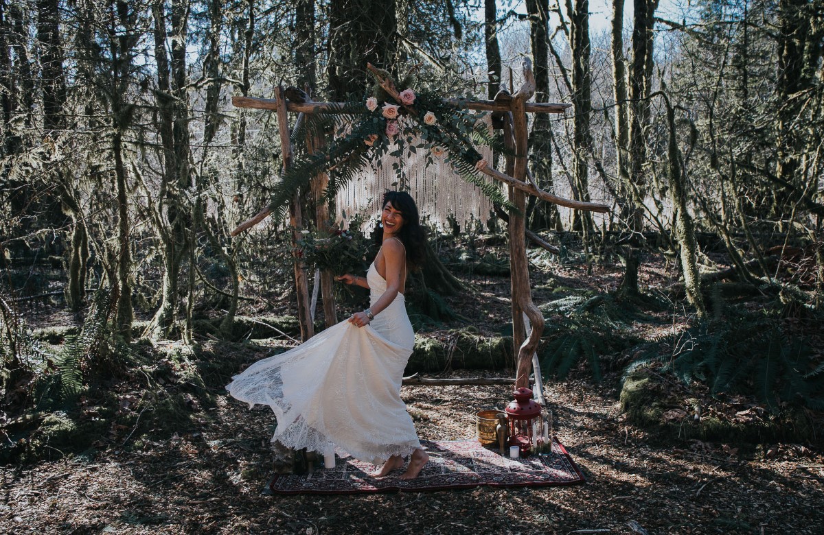 Sun Dappled Pure Magnolia Bride dancing in Woodland Forest West Coast Weddings Magazine