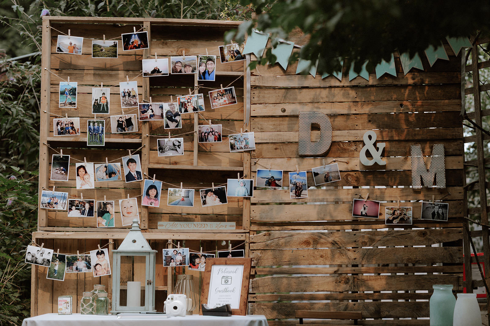 Photo Display on Rustic Boards Anvil Island BC Wedding Magazine