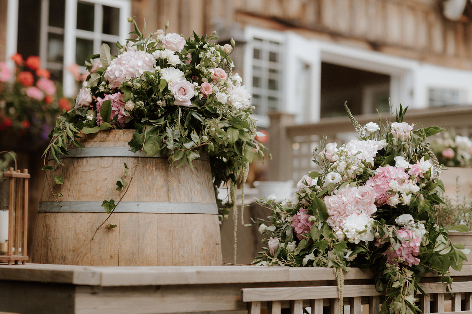 Rustic Floral Arrangements on Wine Barrels Anvil Island Wedding