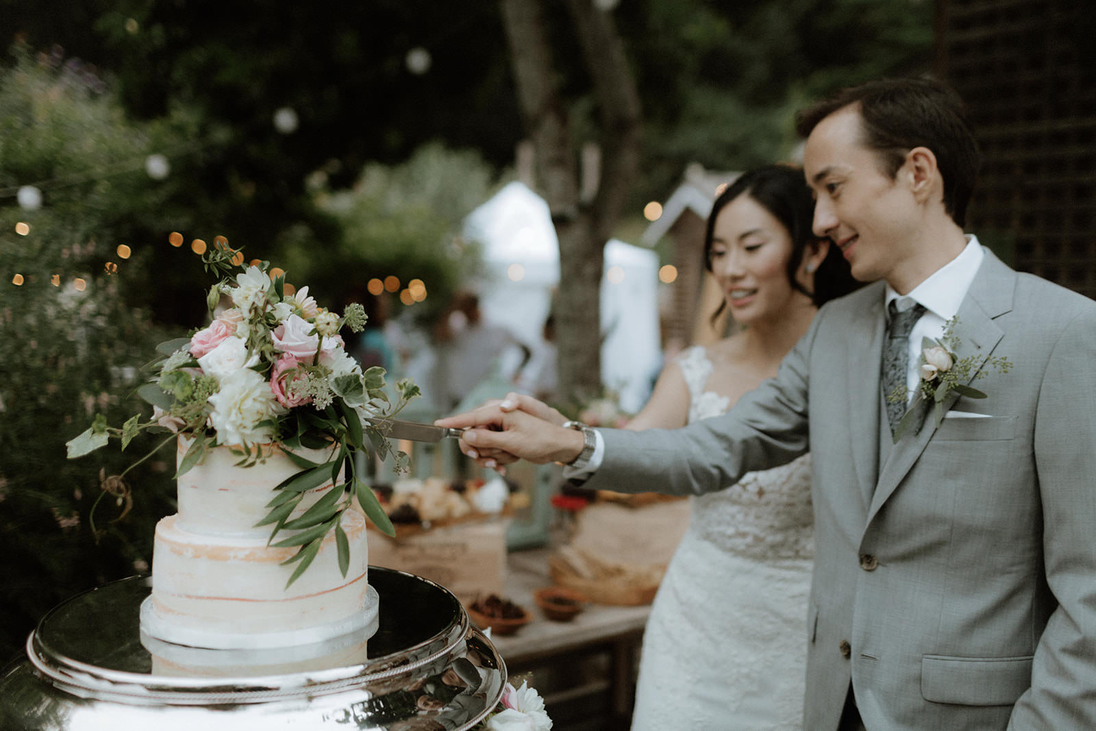 Cake Cutting at Rustic Anvil Island Wedding in British Columbia West Coast Weddings Magazine