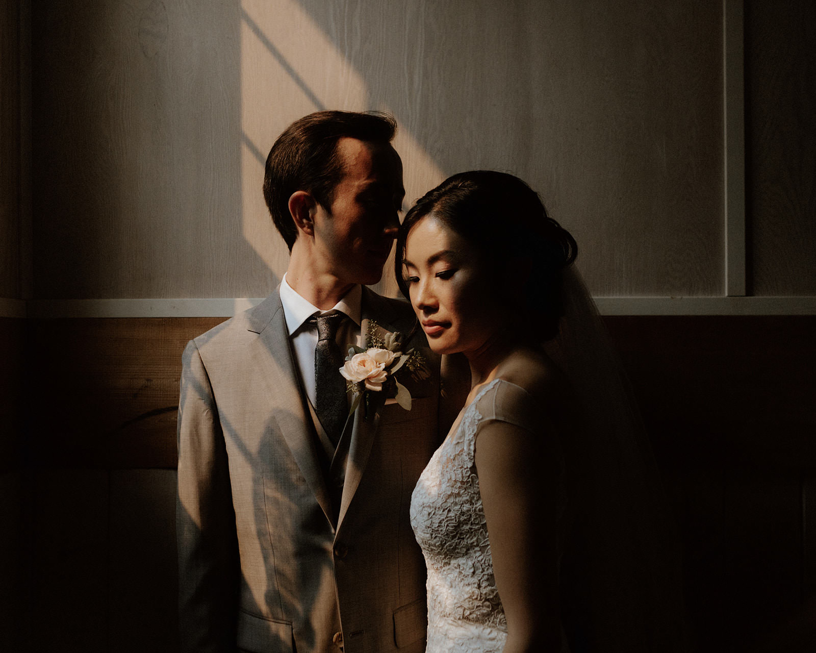 Posed Newlyweds in Shadow at Rustic Anvil Island Wedding by Vancouver Bon Vivant Group