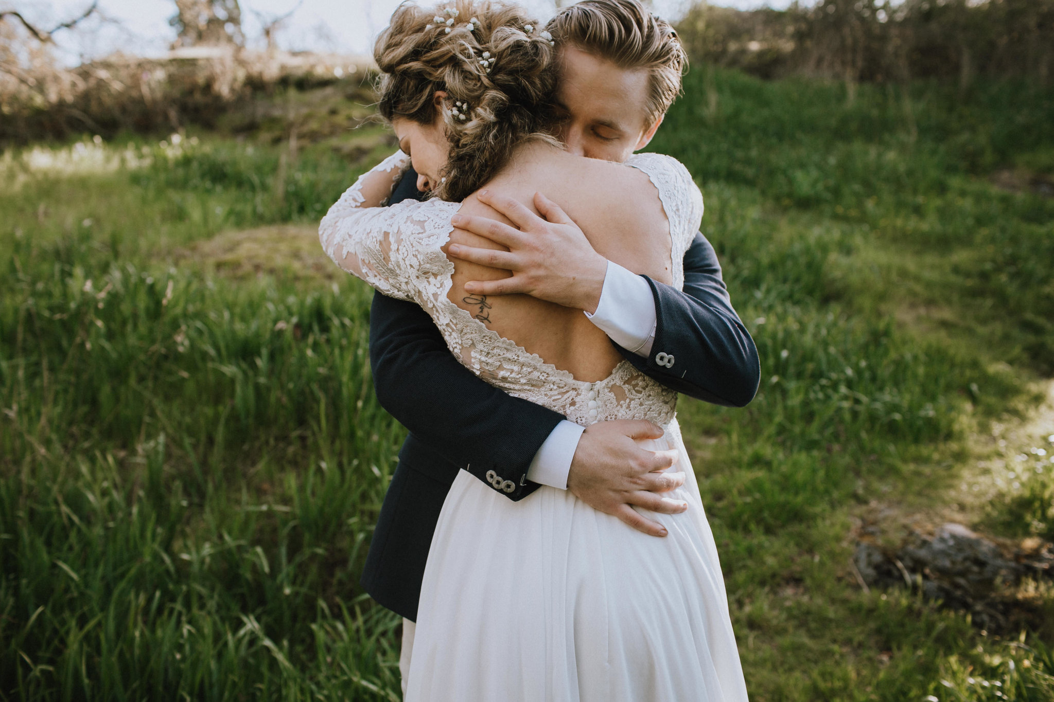 Beach Bridal Session Couple Hugging Hands on her Back Vancouver Island wedding magazine