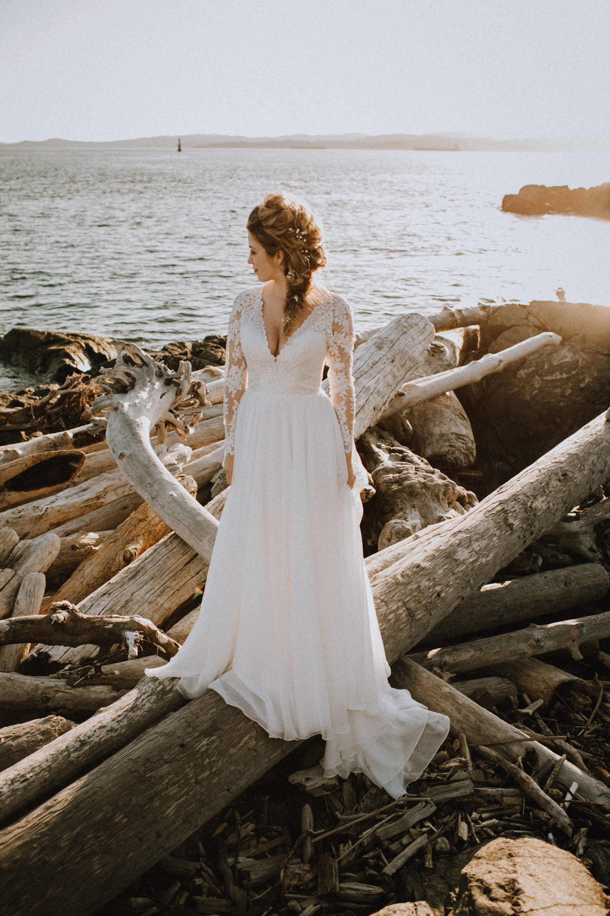 Beach Bridal Session with Wedding Gown on Beach with Driftwood