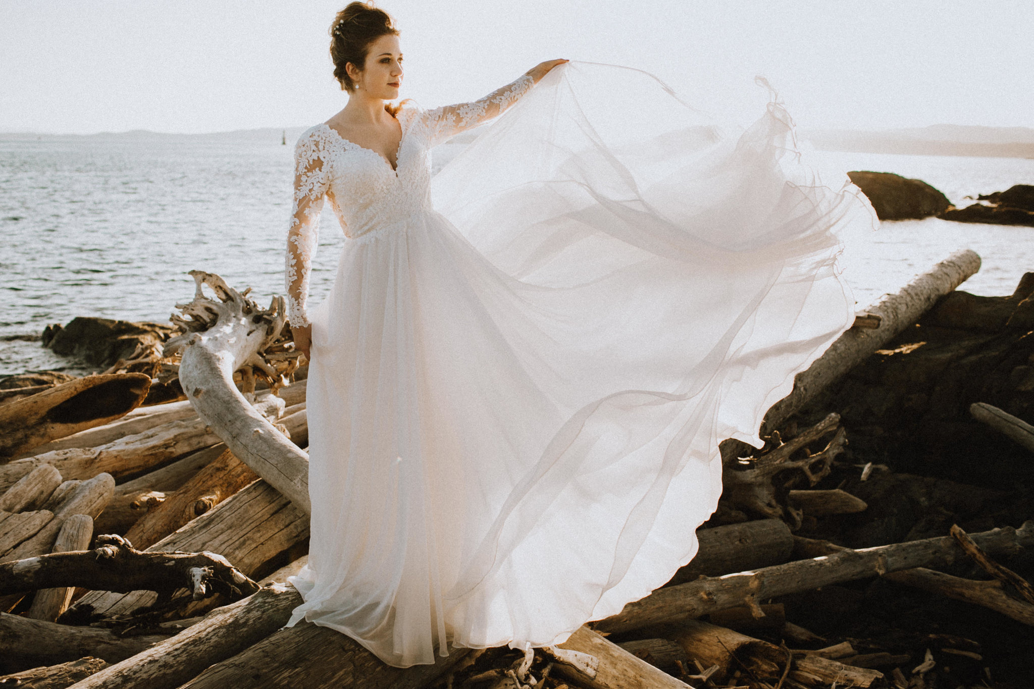 Lis Simon Gown at Beach Bridal Session Skirt in the Wind