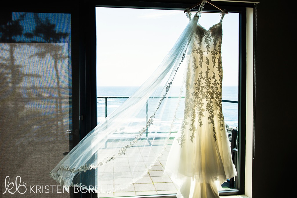 Gown in Window of Black Rock Oceanfront Resort on Vancouver Island West Coast Weddings Magazine