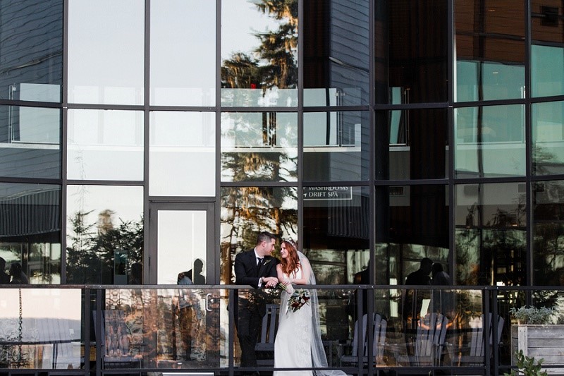 Newlyweds on Balcony at Black Rock Oceanfront Resort on Vancouver Island