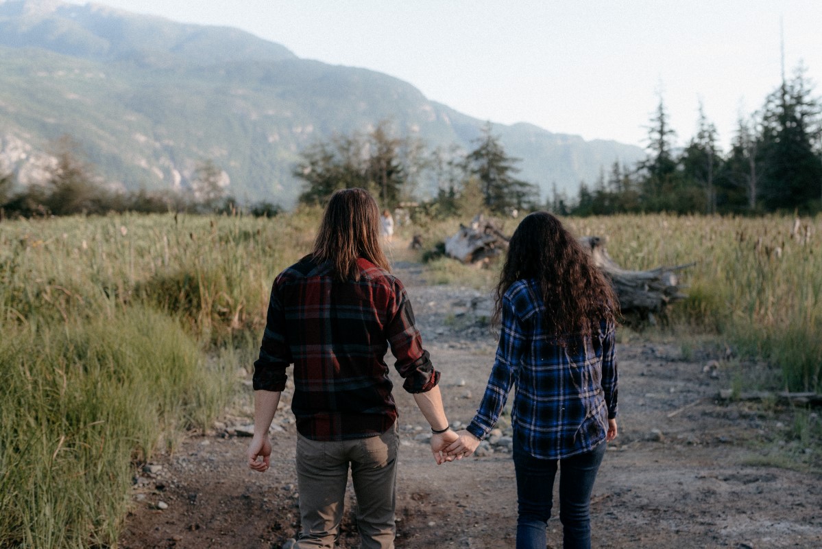 Squamish Engagement Session Holding Hands Vancouver Wedding Magazine