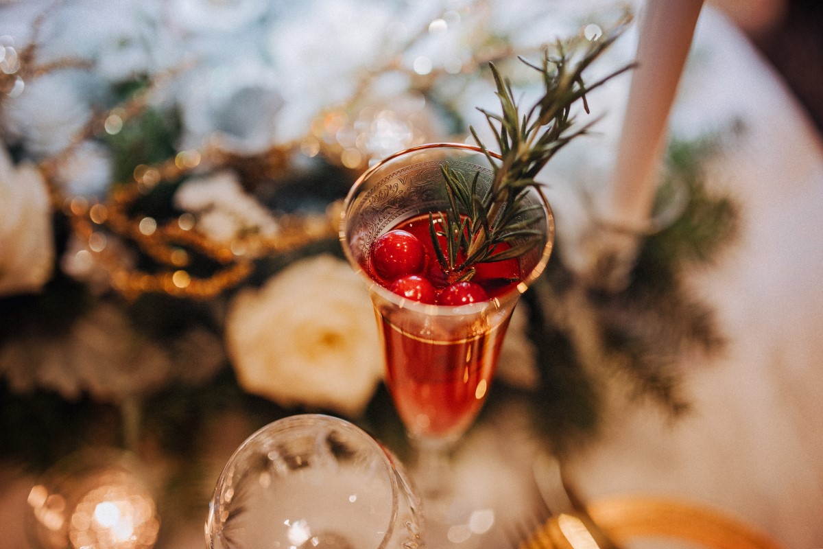 Holiday Glamour at Oak Bay Beach Hotel | Tasha Cline Photography | Beauty Bride | Cake by Taryn | Jennigs the Florist | Bliss Gowns & Events | Madison Paige Hair | Pretty Please Makeup Artistry | Cranberry Cocktail