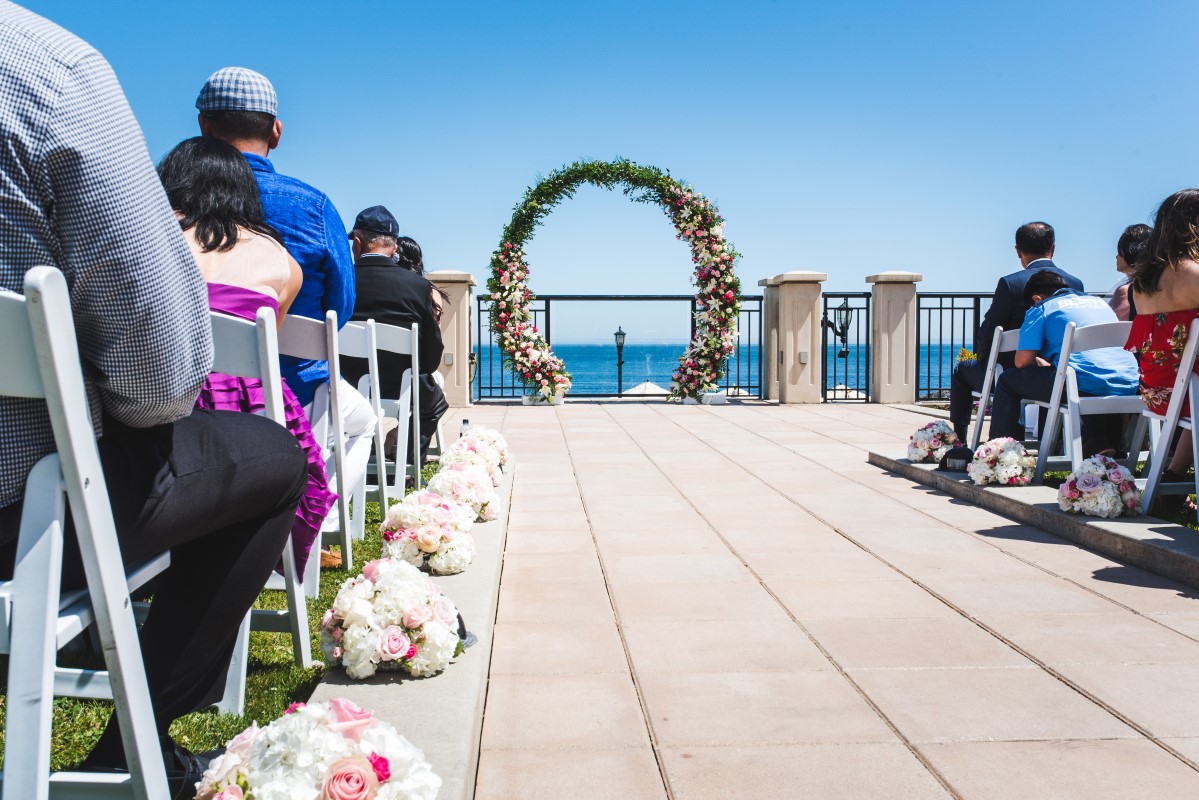 Oak Bay Beach Hotel Wedding with Decorate Victoria Round Ceremony Arch