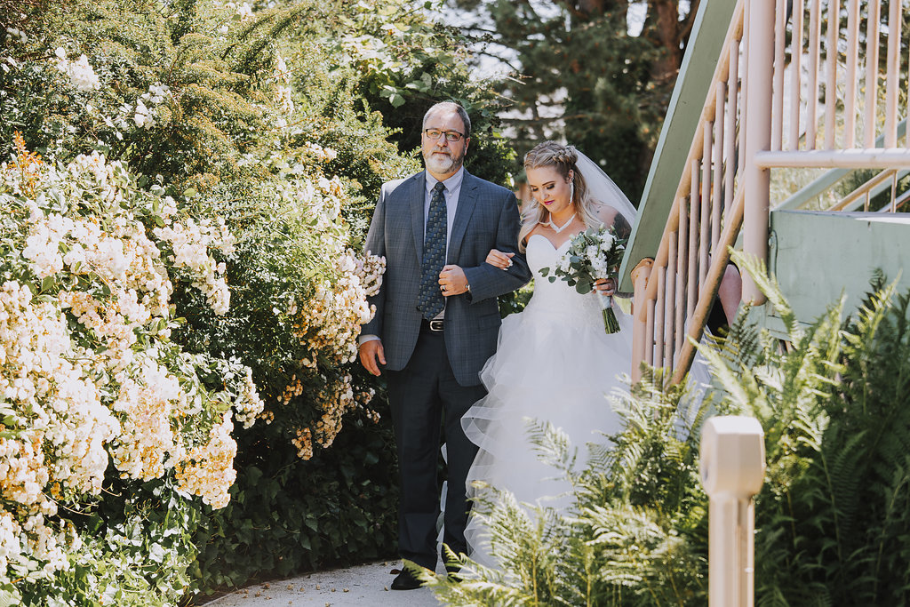 Painters Lodge Bride walking down aisle to ceremony Outer Island Photography