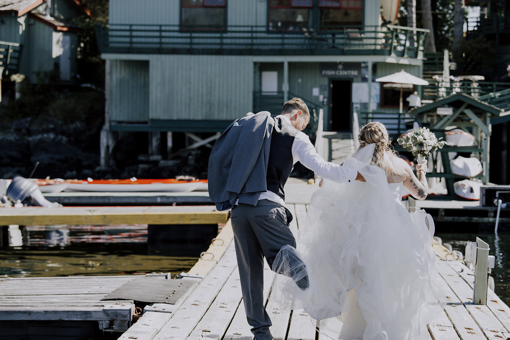 Painters Lodge Newlyweds candid photo of gown Outer Island Photography