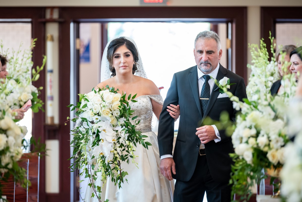 Bride and Father Walk Down the Aisle of Our Lady of Assumption Church in Vancouver