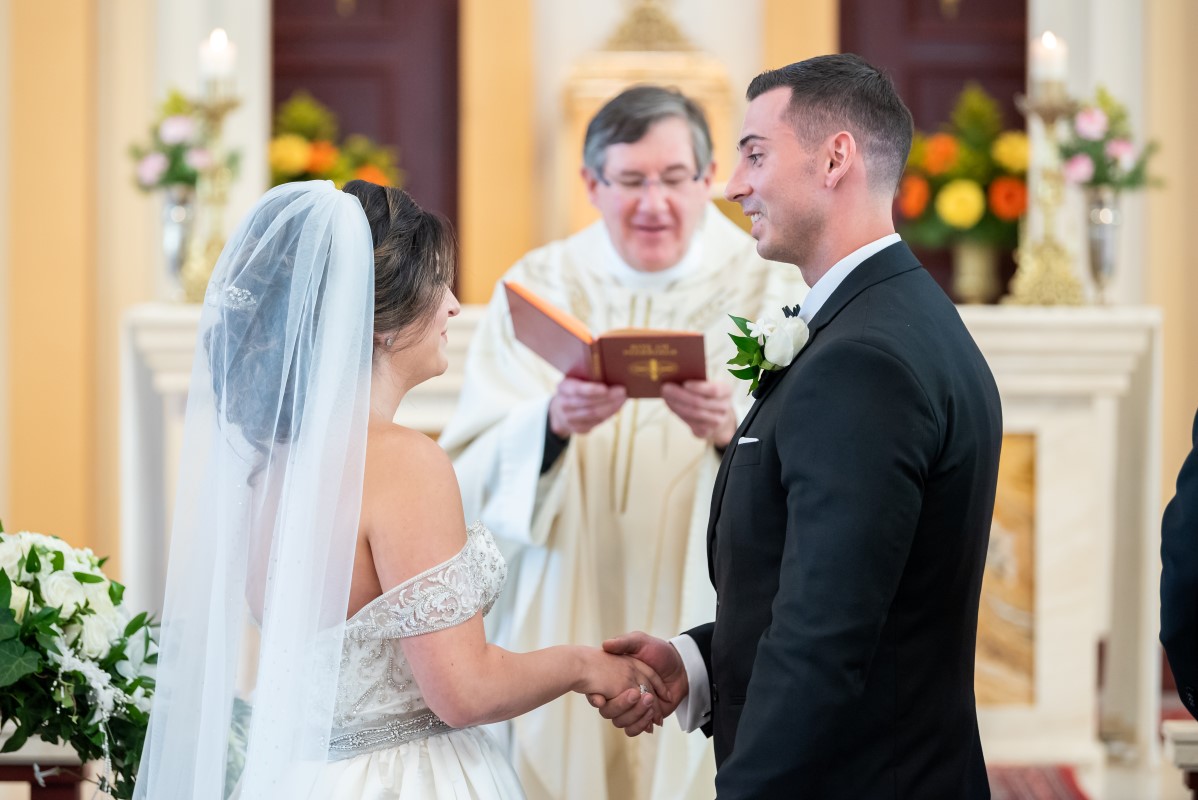 Couple exchange church wedding vows