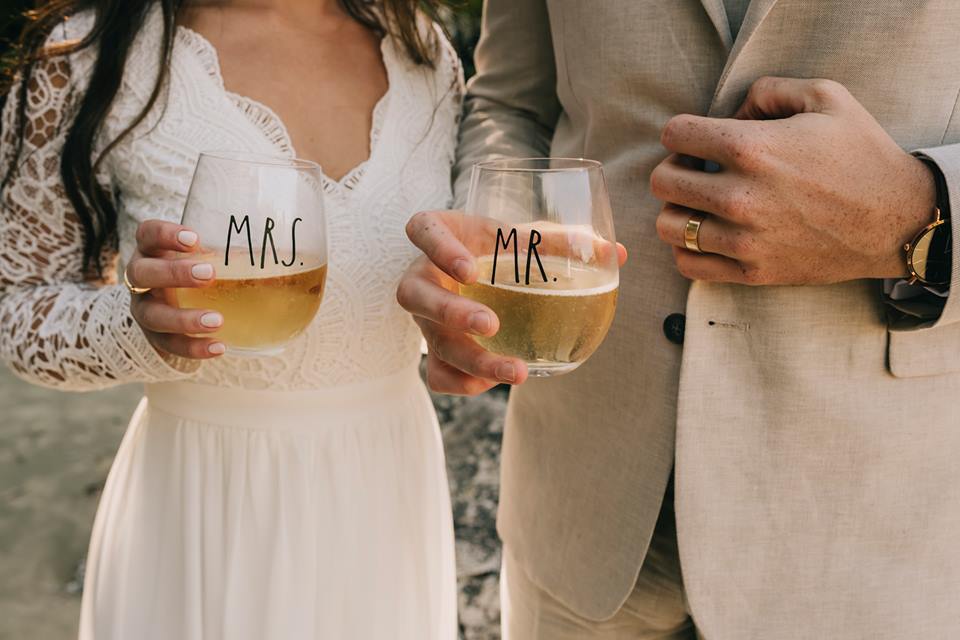 Tofino Elopement with Mr and Mrs Champagne Glasses on the beach of Vancouver Island