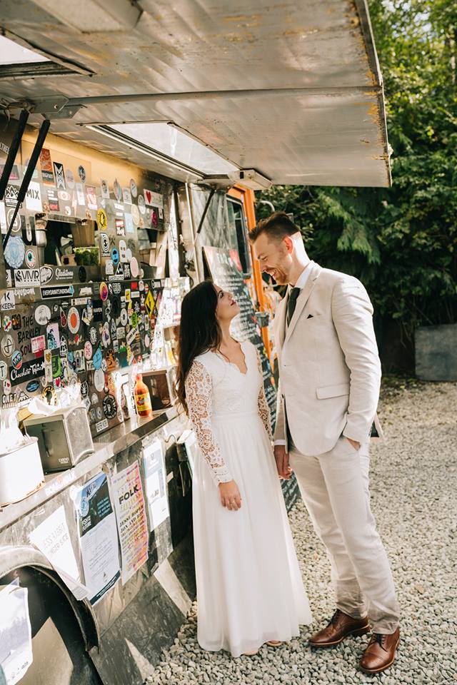 Tofino Elopement Couple having tacos at Tacofino Truck on Vancouver Island