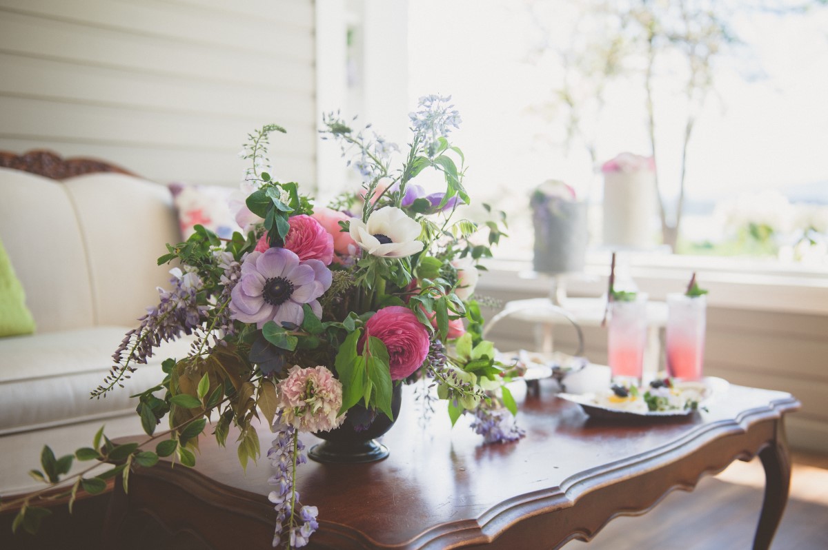 Anemones and roses on gin deck at Cowichan Valley wedding,