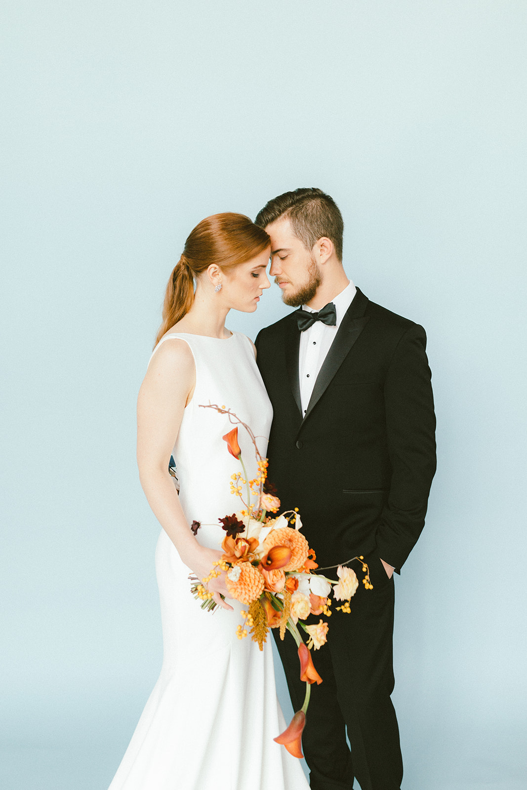 Modern Bridal Couple featuring groom in The Tux Store with bowtie Vancouver West Coast Weddings Magazine