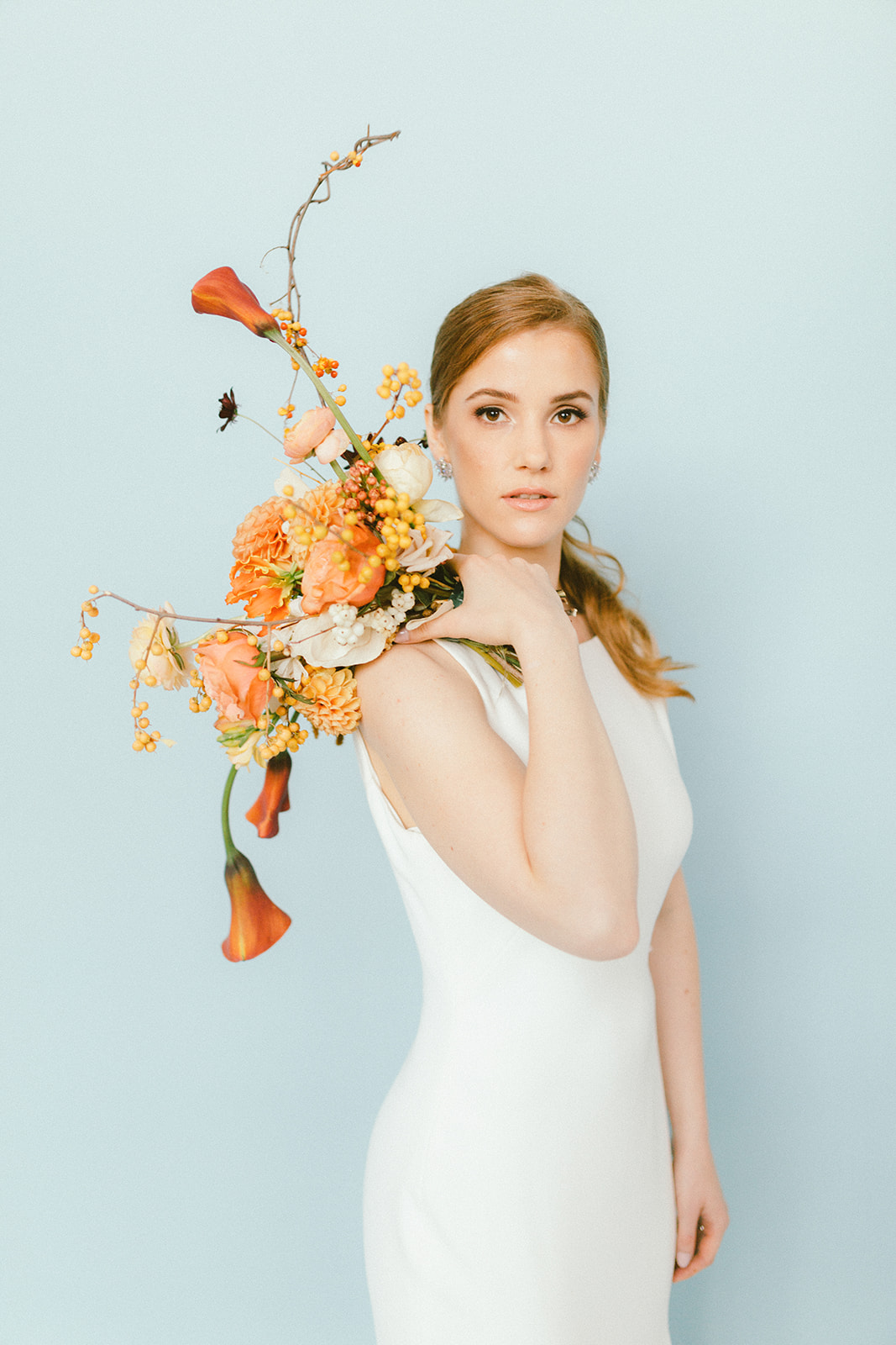 Modern Bridal Bouquet of orange dahlias and orange calla lily Da Fiori Design and Bisou Bridal