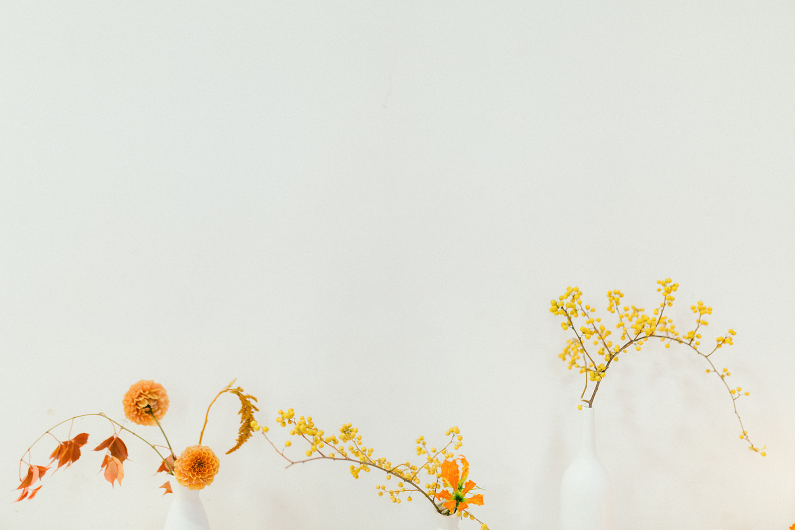 Orange and Yellow Floral on Modern Art Wedding Table by Da Fiori Vancouver Flowers