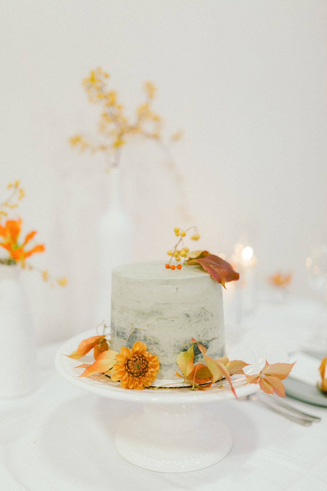 Modern Art Wedding Cake with Orange and Yellow Flowers by Jenny Bakes in Vancouver