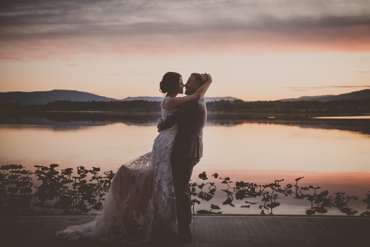 Newlyweds embrace in the sunset of Cowichan Valley West Coast Weddings