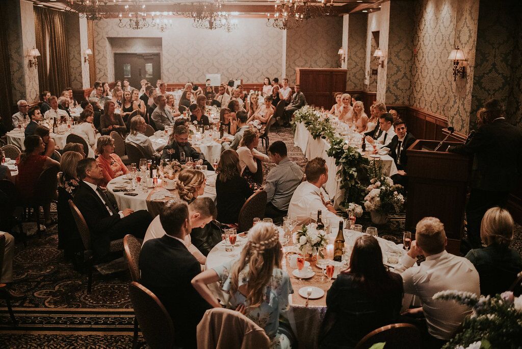 Romantic Oak Bay wedding reception shot from above of all reception guests