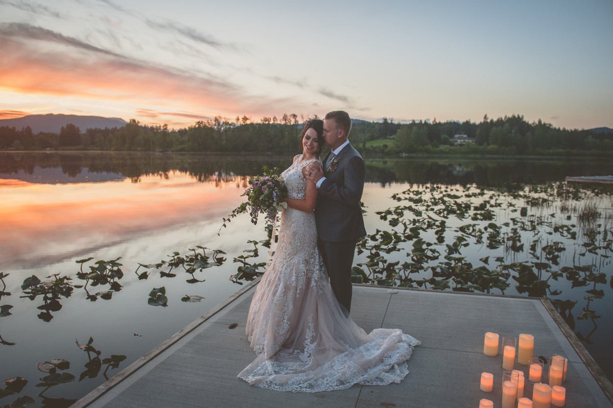 Bride and Group on Lake Deck with Sunset in Cowichan Valley