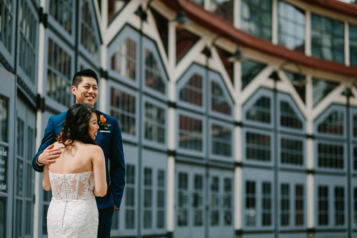 Vancouver Wedding Couple in front of city buildings