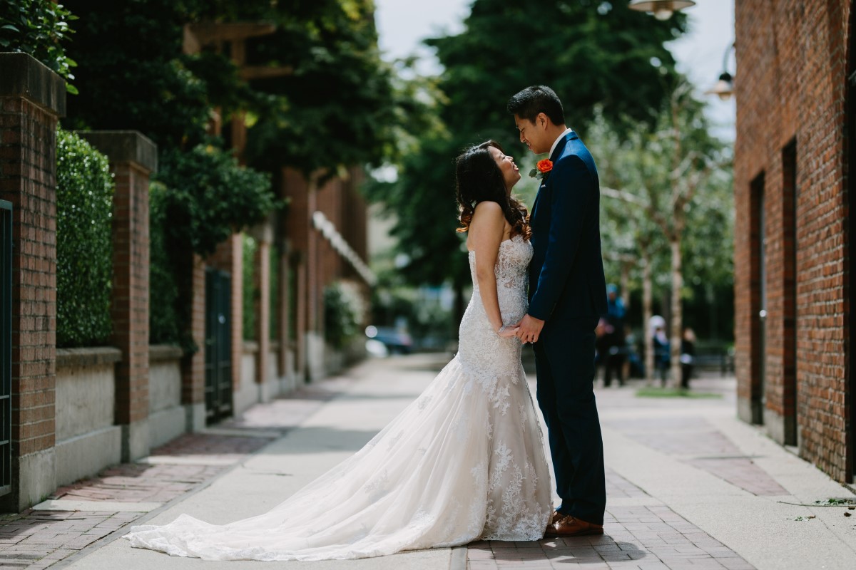 Chinese Fusion Wedding Couple on Vancouver Street Lined by Trees