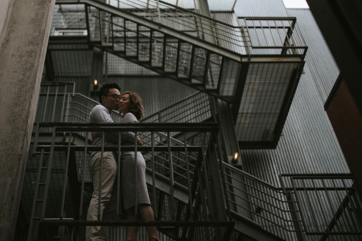 Vancouver couple share a kiss on the fire escape