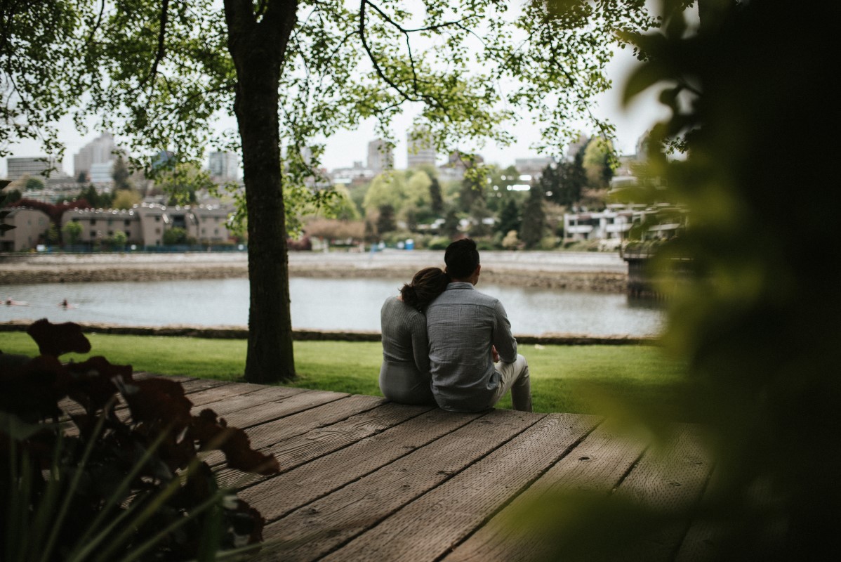 Engaged Couple Looking over the Water