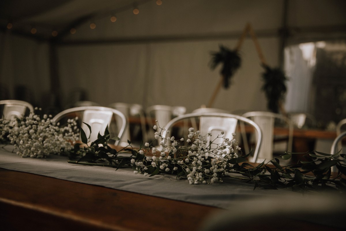 Babys Breath Gypsophila and Italian Ruscus on Wood Tables Wedding Reception Vancouver Island