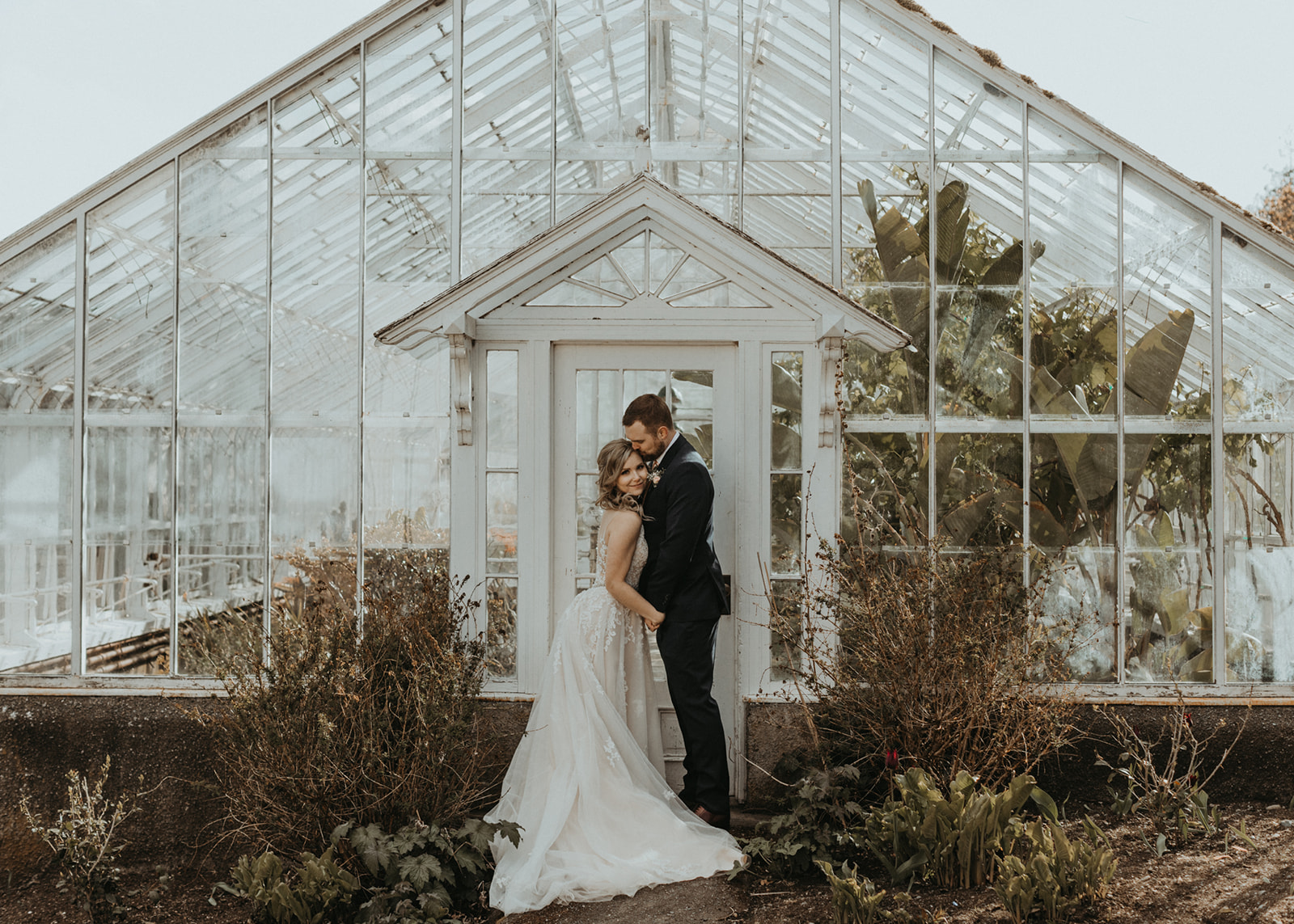 Hatley Castle Newlyweds inside Greenhouse for wedding portrait